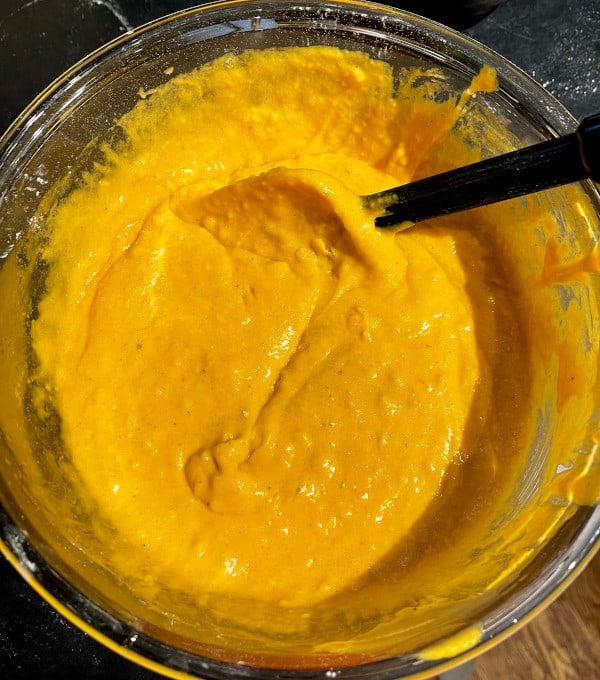 A bowl of mango cake batter.