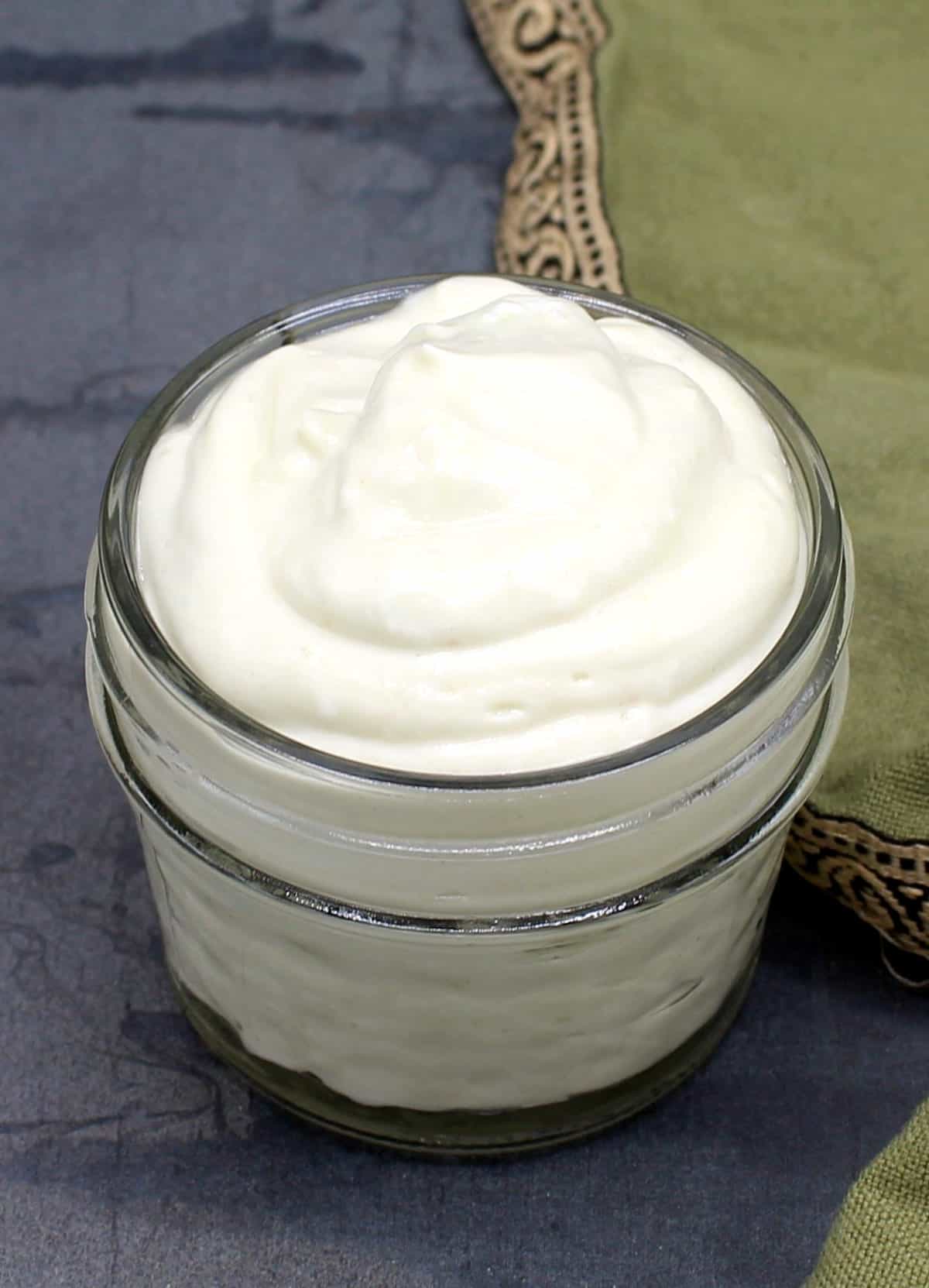 Closeup photo of creamy vegan mayonnaise freshly made.