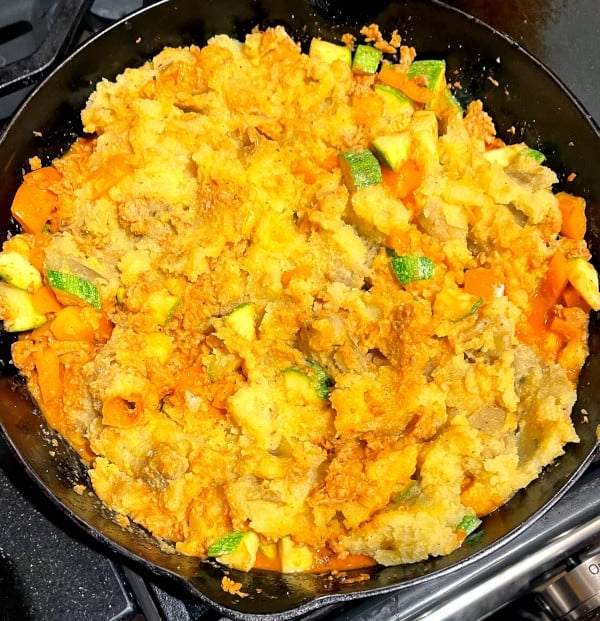 Cheezy vegan dinner bake in cast iron pan