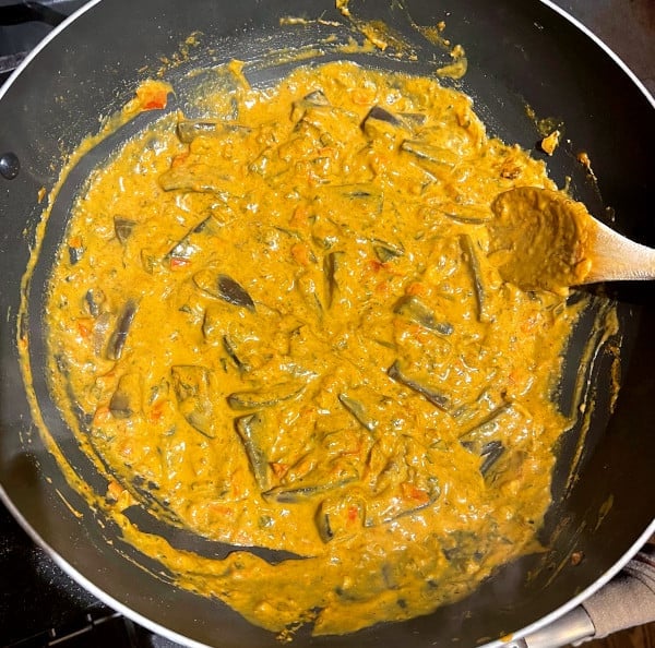 Prepared vegan dahi baingan in wok.