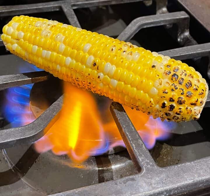 Corn roasting on a stovetop