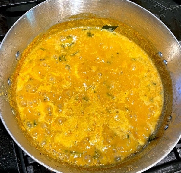 Pitlai cooking in saucepan