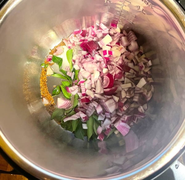 Onions, curry leaves and cumin seeds in IP