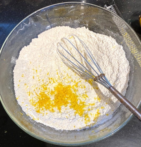 Lemon zest added to flour, baking soda and baking powder