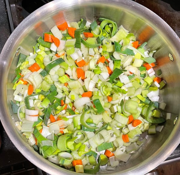Veggies added to saucepan with garlic