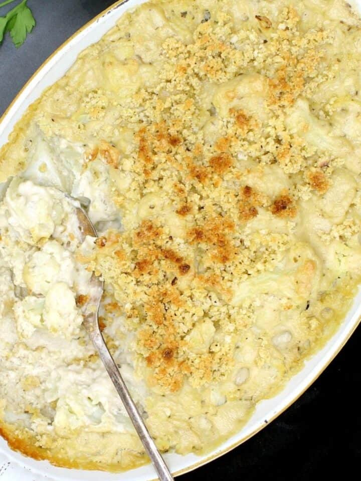 Closeup of vegan cauliflower casserole in baking dish.