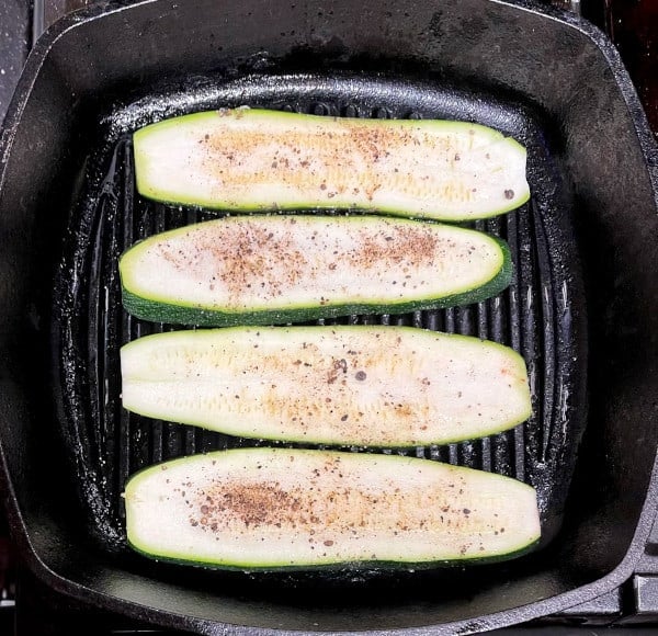 Zucchini slices on grill pan.