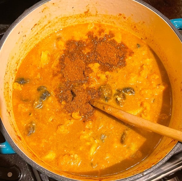 Garam masala stirred into black eyed peas curry.