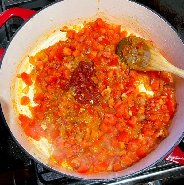 Tomato paste added to tomato sauce.