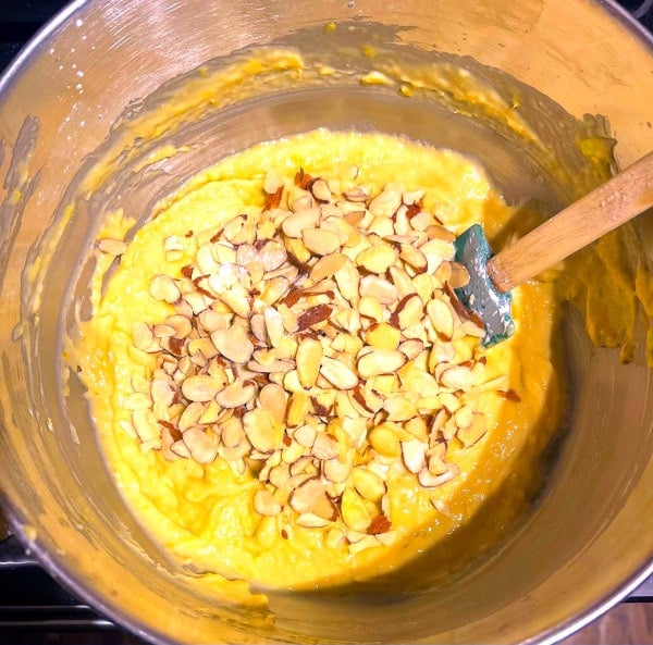 Almonds stirred into the Greek new year's cake batter.