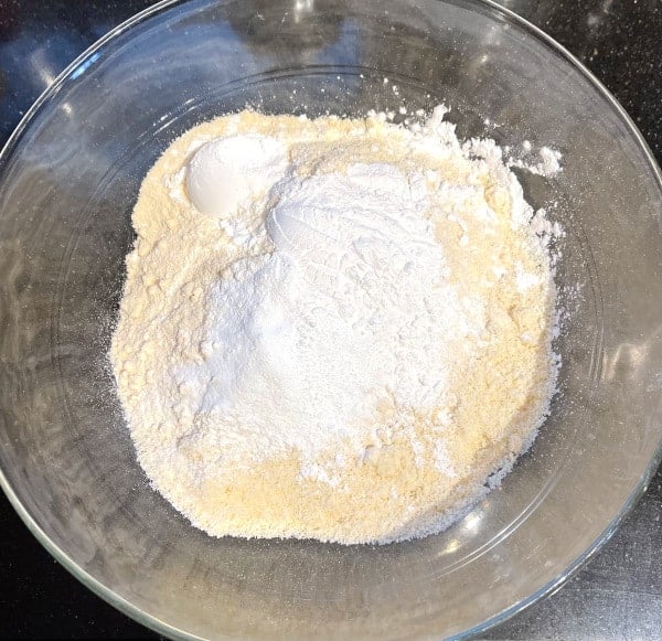 Dry ingredients for vegan keto pancakes in bowl.
