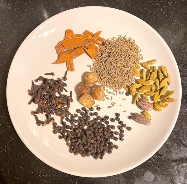 Spices on plate for mekelesha spice blend.