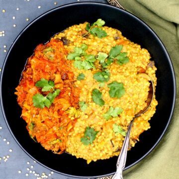 A pan of food on a plate, with Khichdi