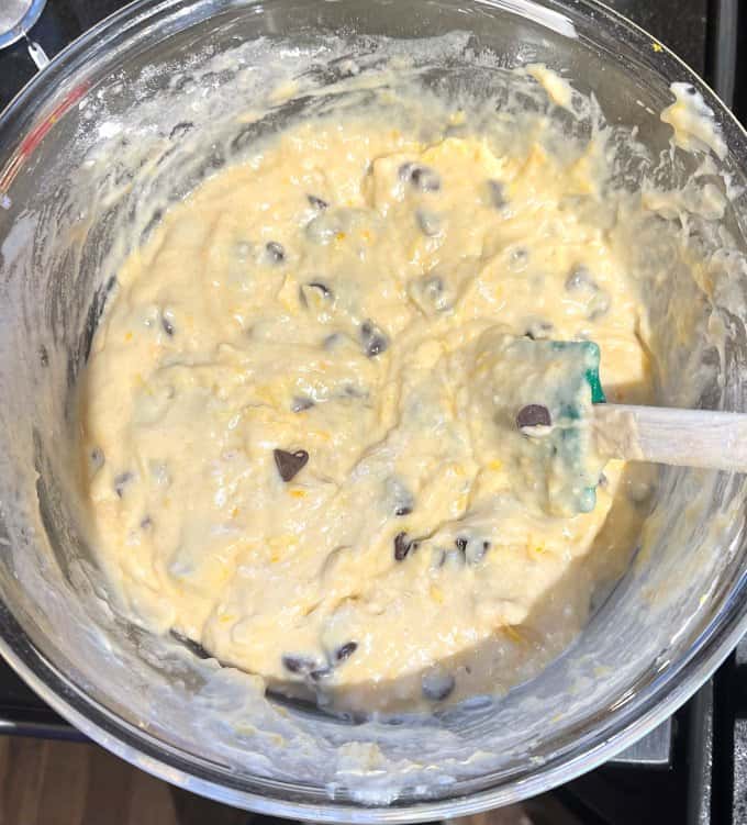 Chocolate chips stirred into batter.