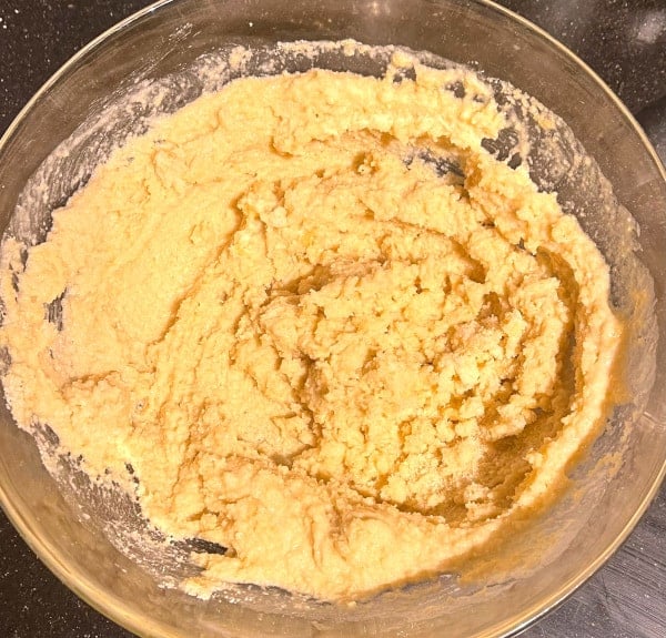 Batter for keto chocolate chip cookie dough mixed in bowl.