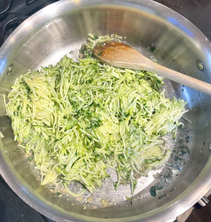 Zucchini added to saute pan for zucchini rice.