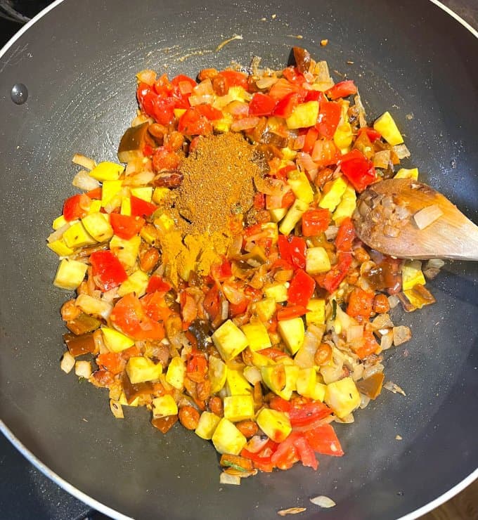 Spices added to wok.