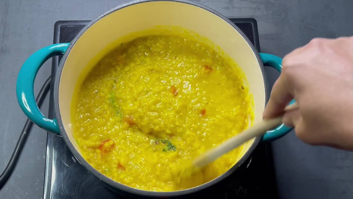 Dal added to first tarka.