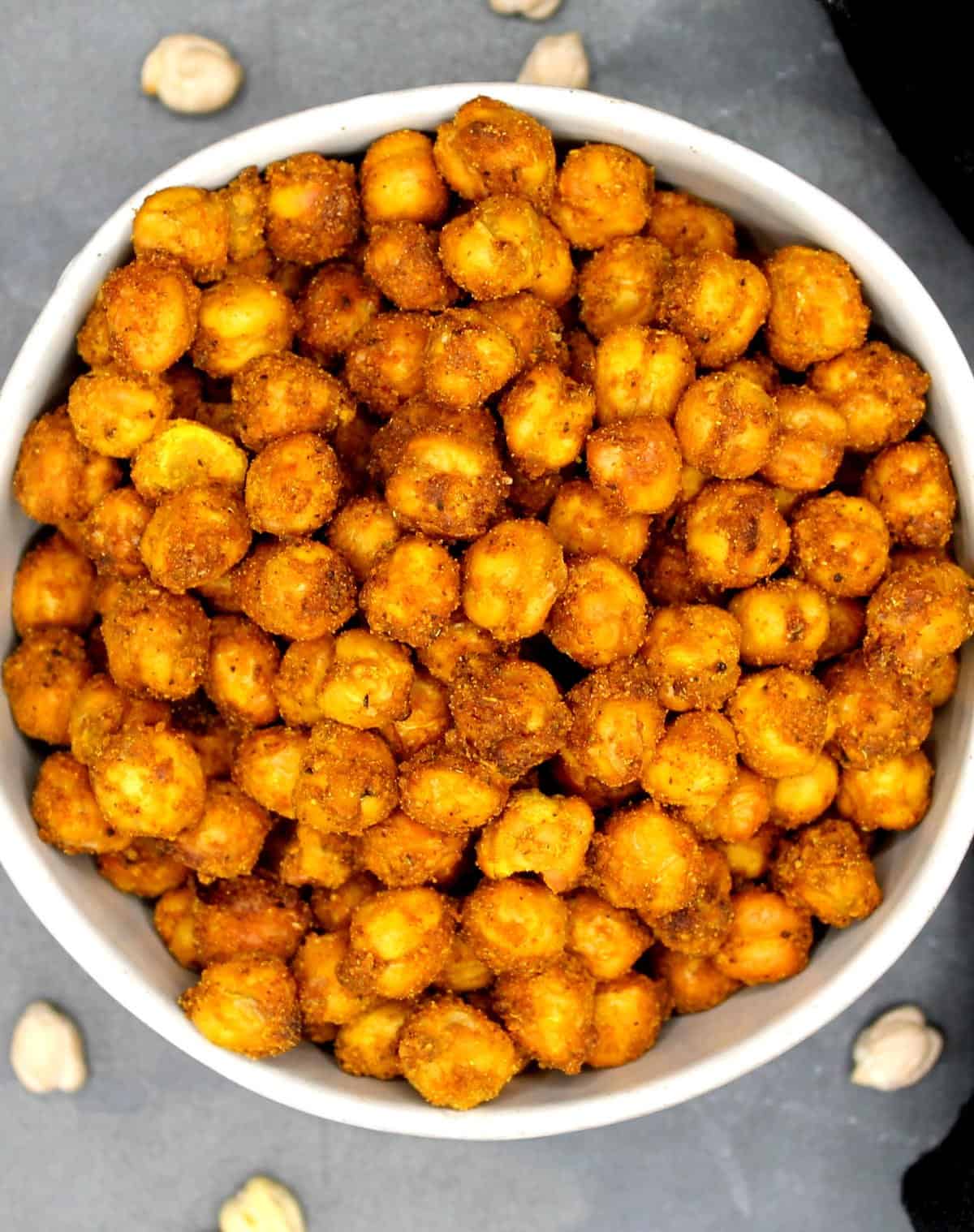 Air fried chickpeas in a gray bowl on darker gray background.