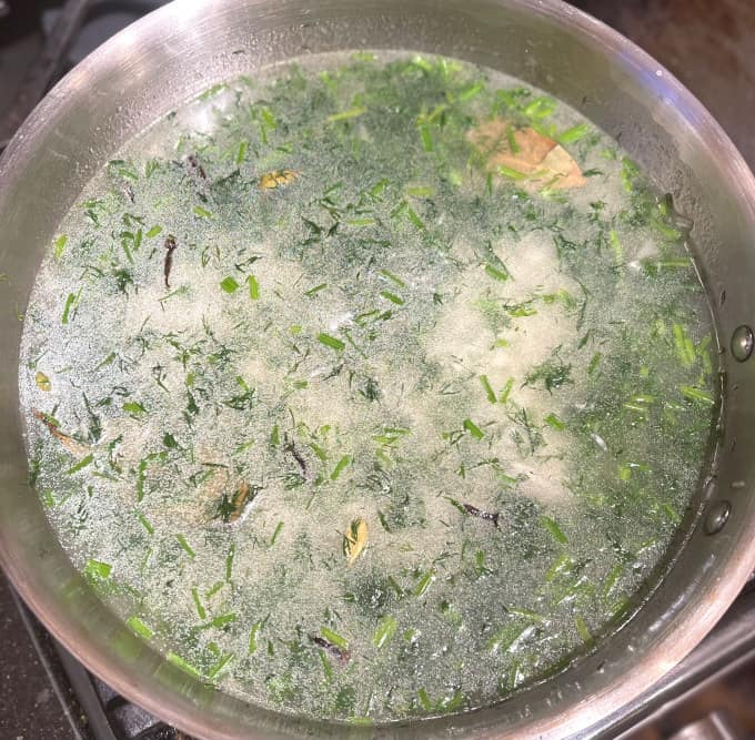 Water added to dill and rice.