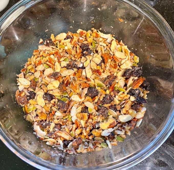 Keto granola ingredients mixed in bowl.