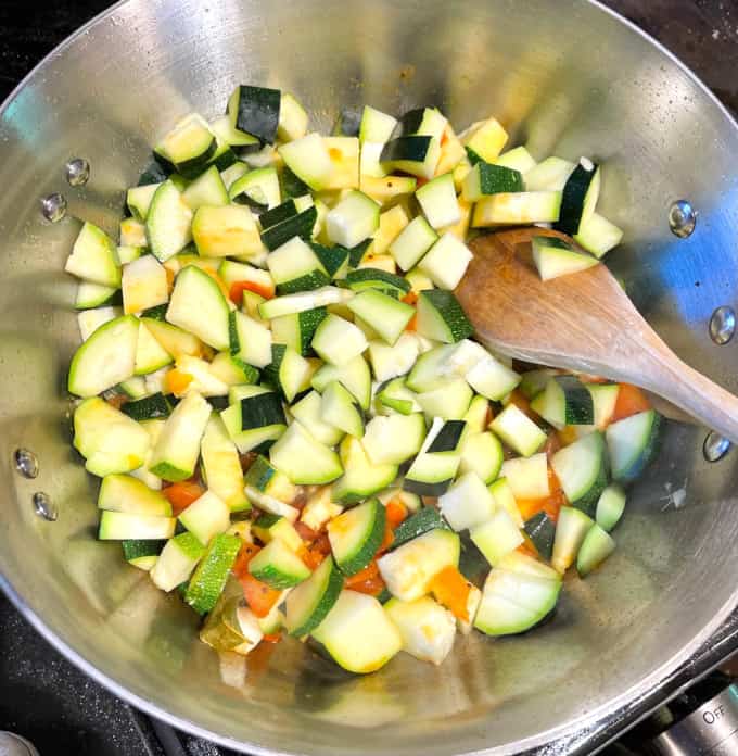 Vegetables added to pot.