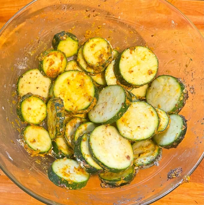 Zucchini in bowl ready for air fryer.