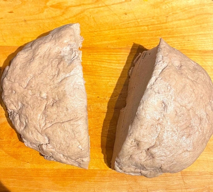Bread dough divided in half.