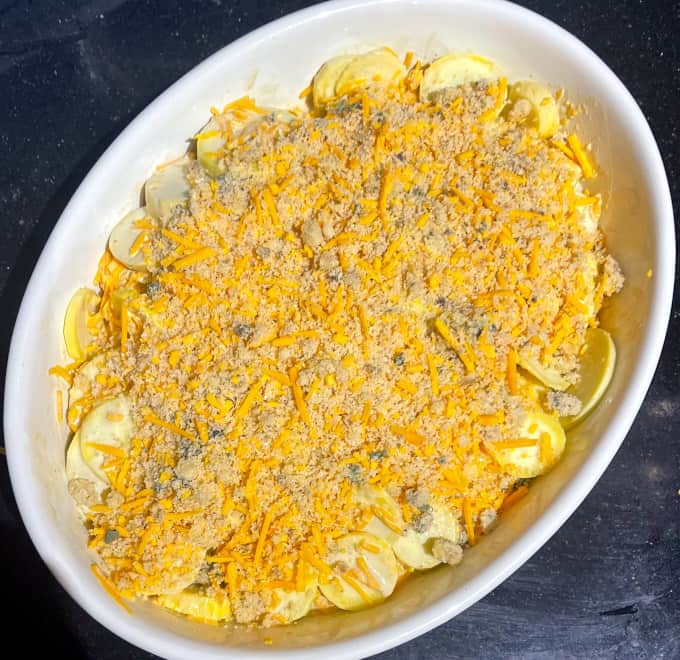 Squash casserole with cheddar topping.