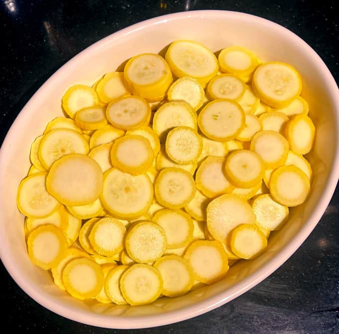 Yellow squash in casserole dish.