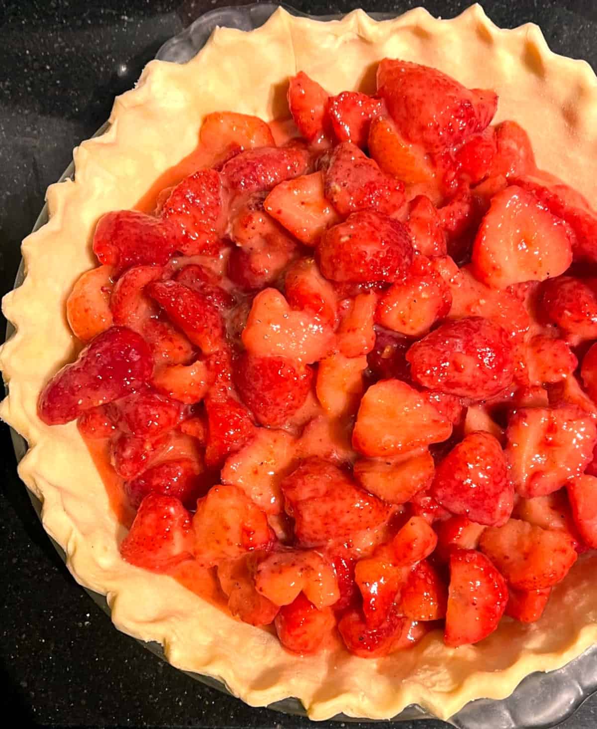 Strawberry filling in vegan pie crust.