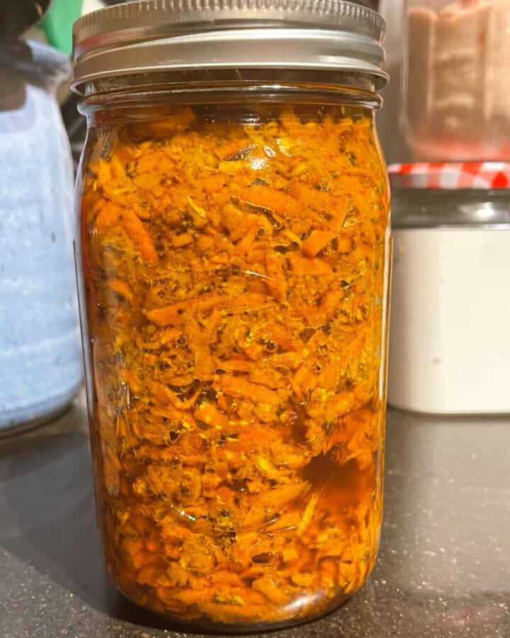 Carrot pickle or gajar ka achar in mason jar.