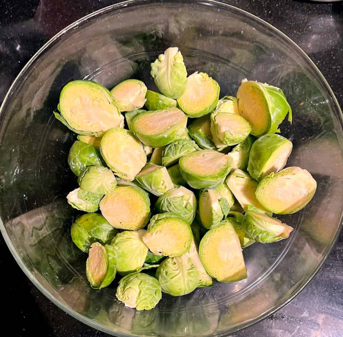 Chopped Brussels sprouts in bowl.