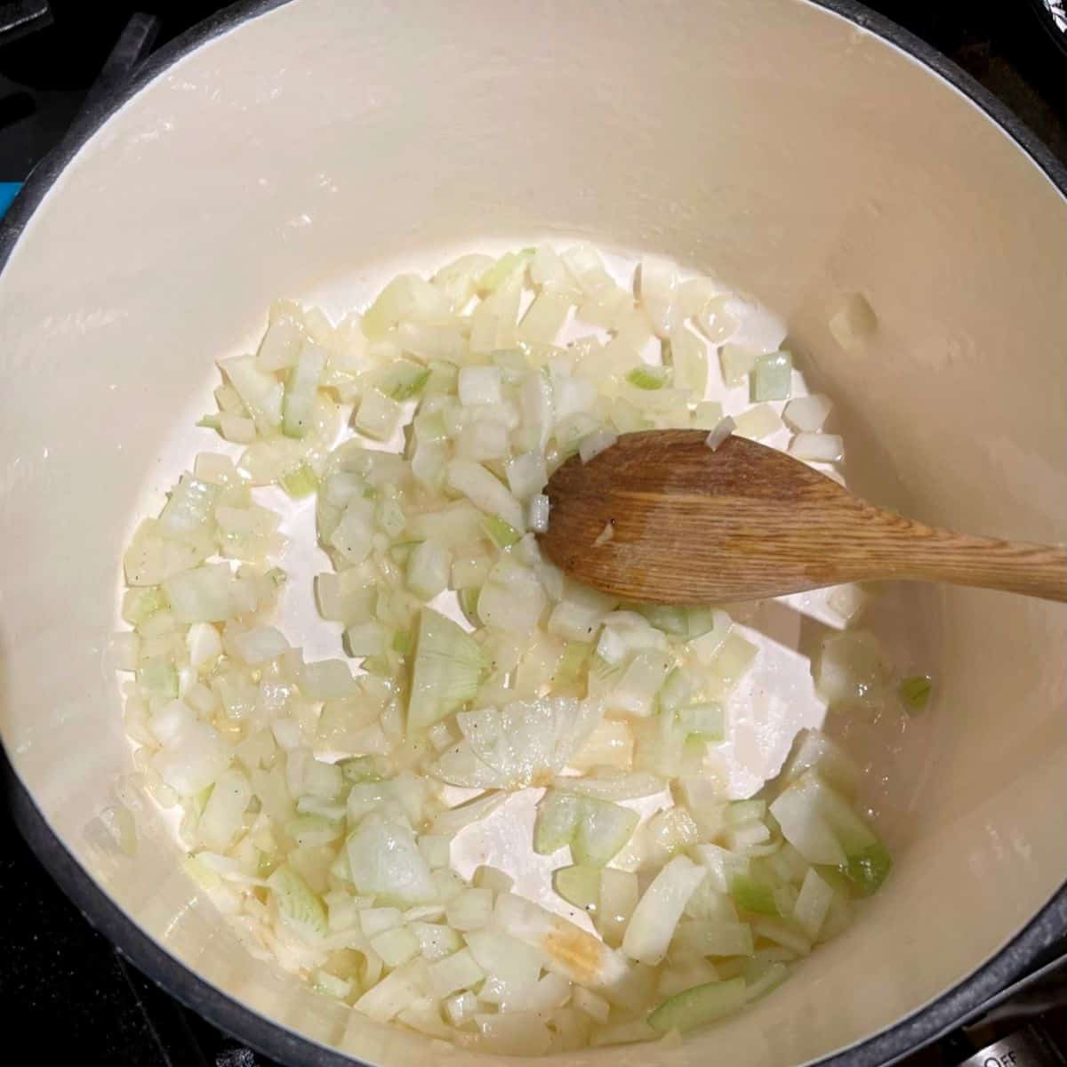 Onions sauteing in Dutch oven.