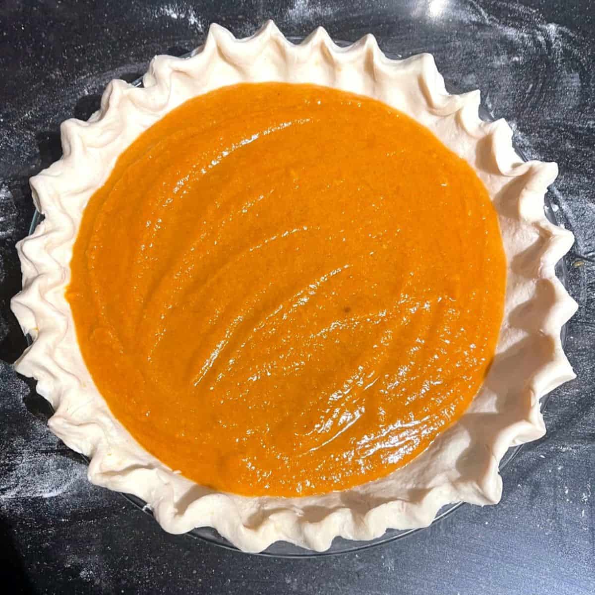 Vegan pumpkin pie before baking.