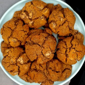 Vegan chocolate ginger cookies on blue plate.