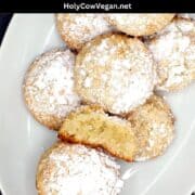 Vegan amaretti cookies in plate with text that says "vegan Italian amaretti cookies".