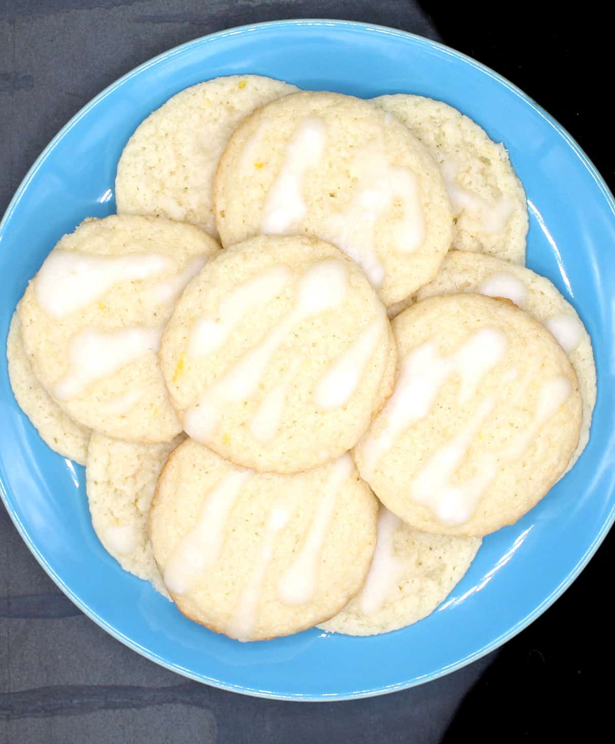 Vegan cream cheese cookies on blue plate.