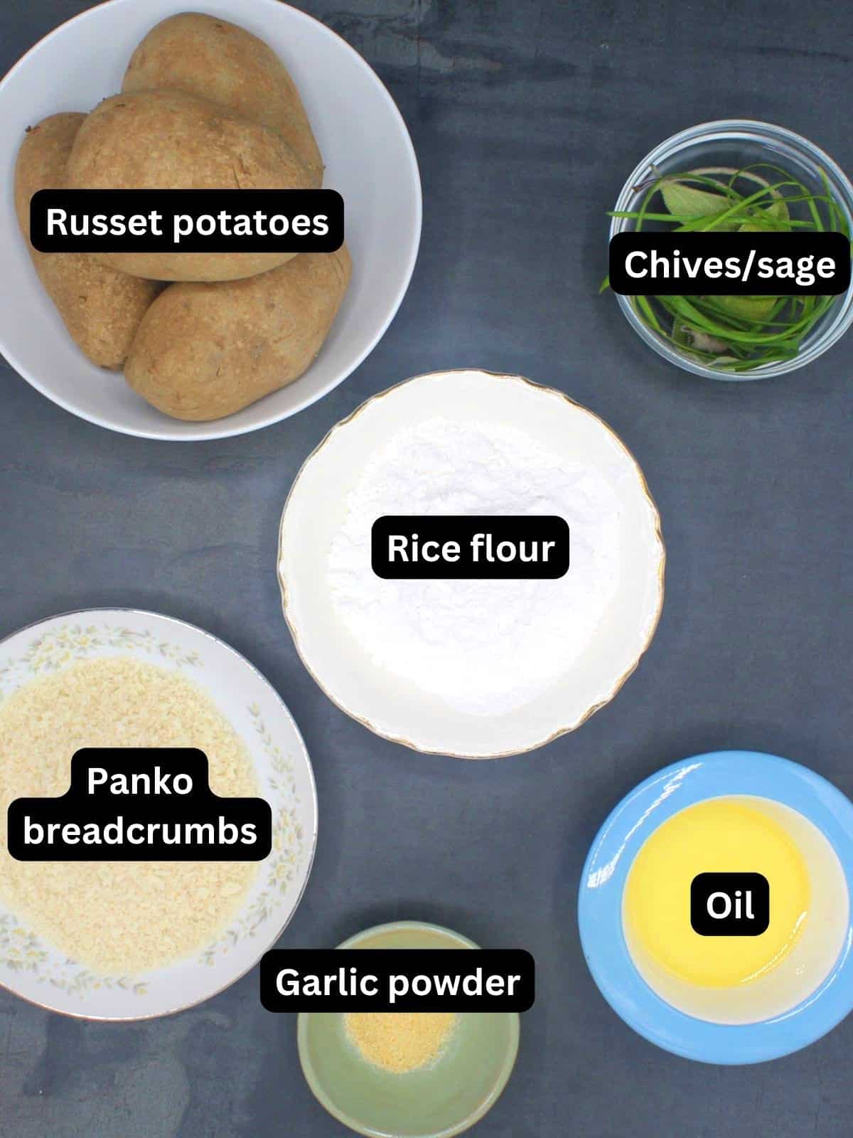 Ingredients for potato latkes in bowls.