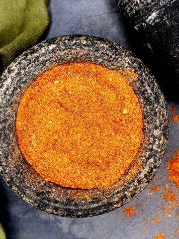 Berbere spice blend in mortar and pestle.