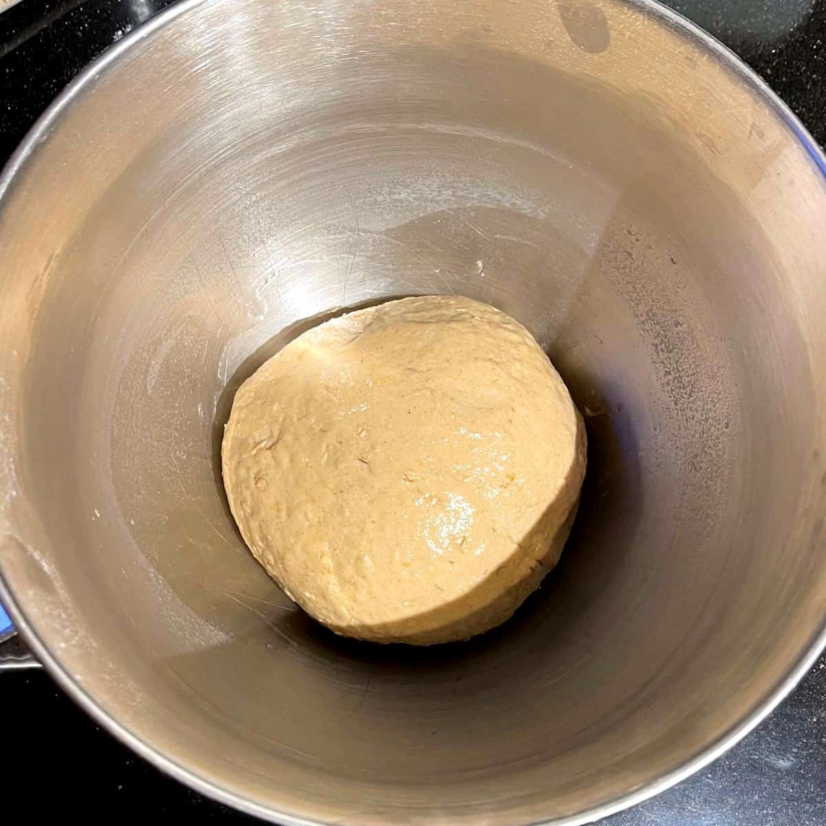 Kneaded dough in bowl.