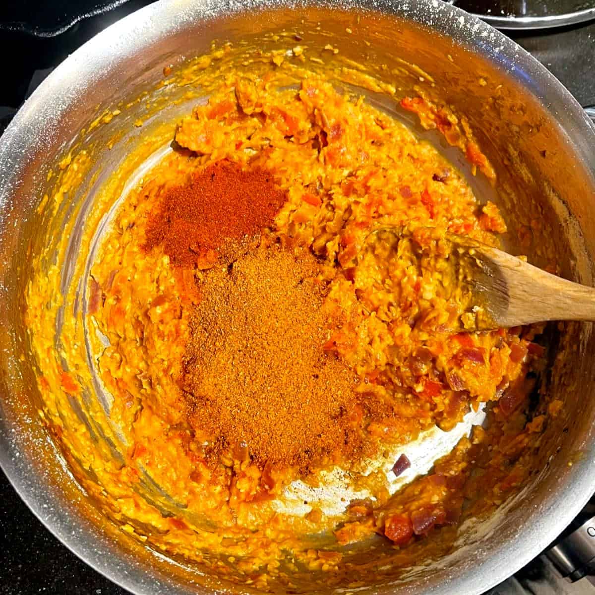 Paprika and berbere added to chickpea flour.