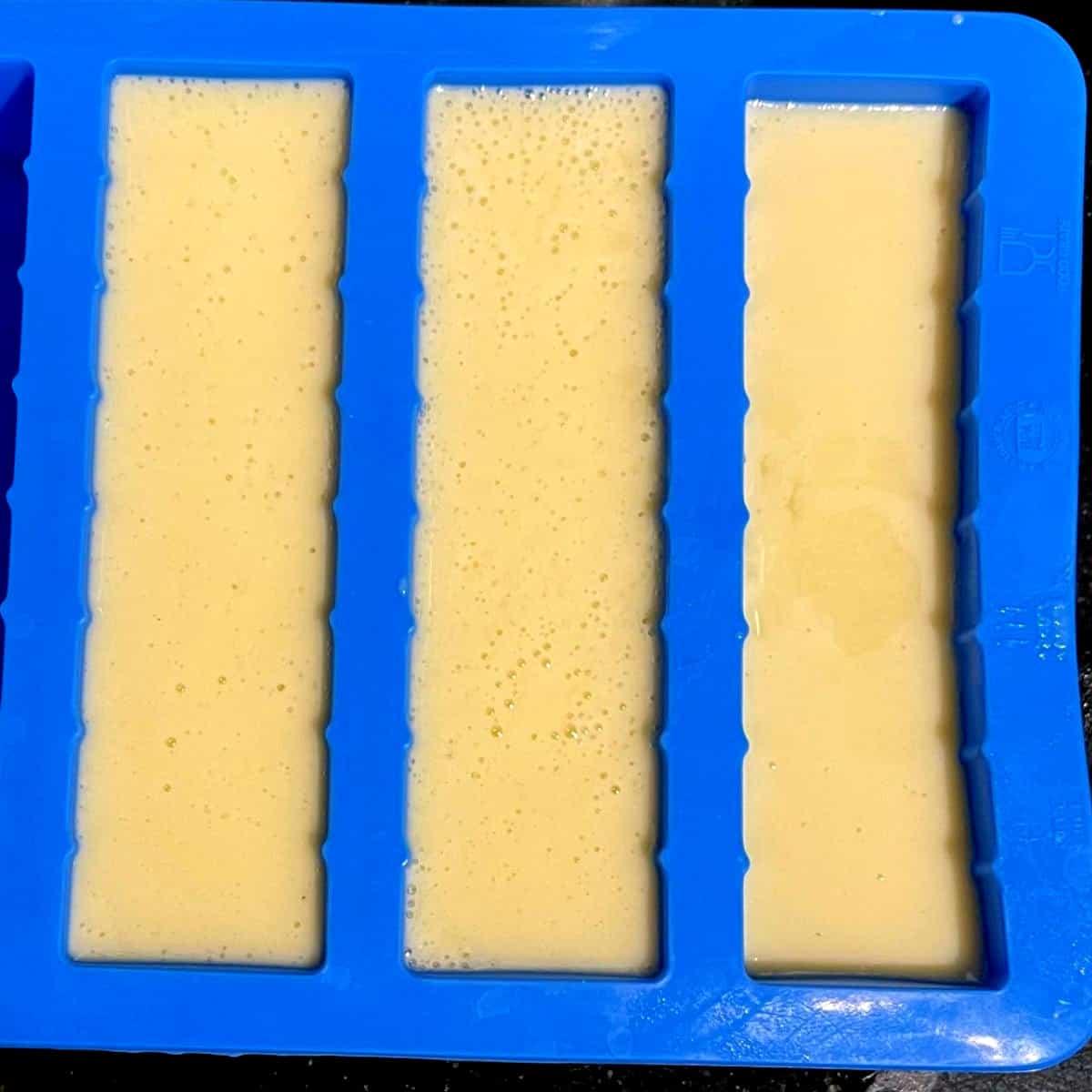 Vegan butter sticks in mold before setting.