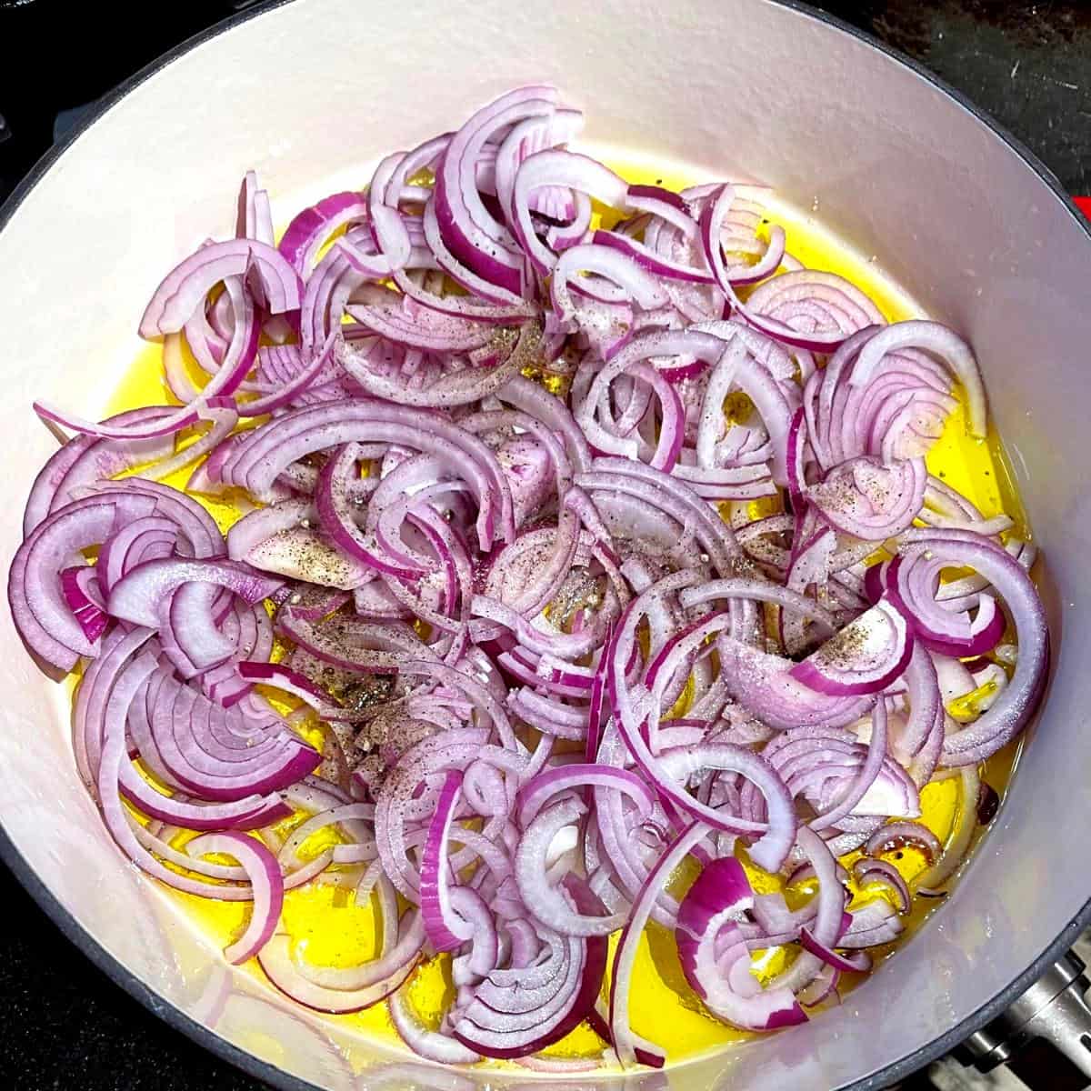 Onions frying in olive oil.