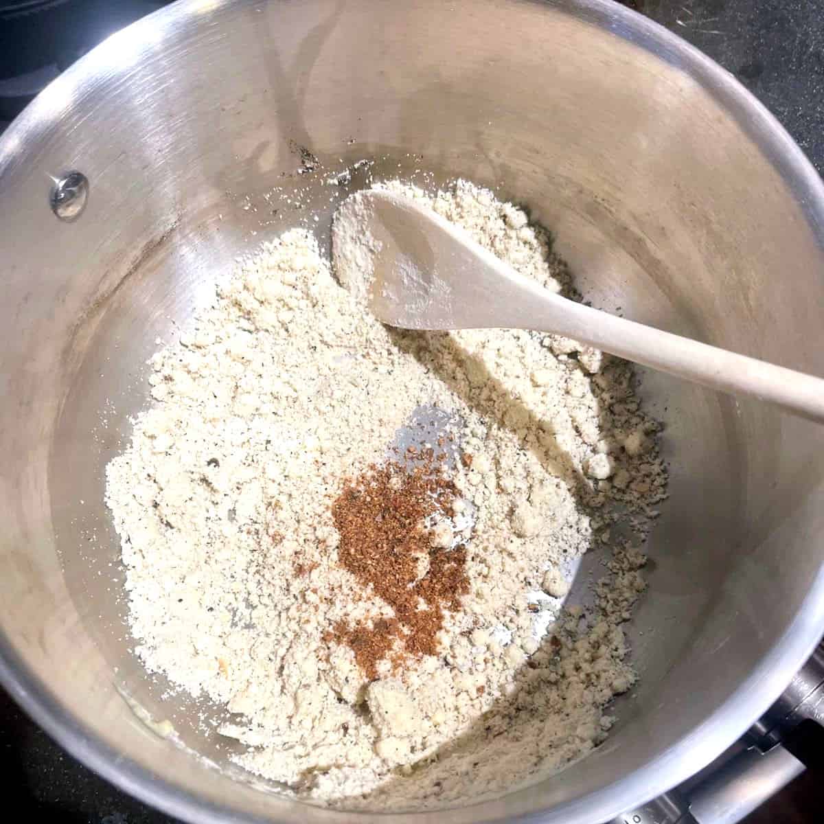 Nutmeg added to roux for vegan bechamel sauce for moussaka.