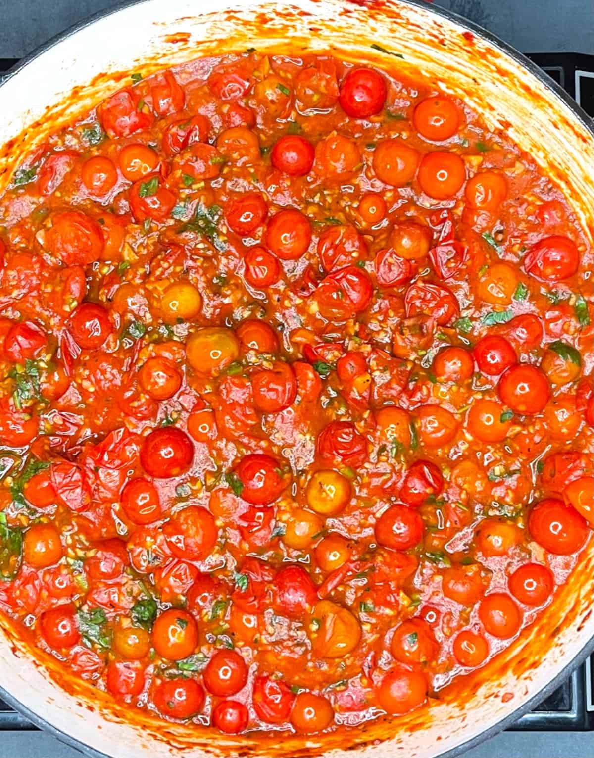 Fresh cherry tomato pasta sauce in skillet.