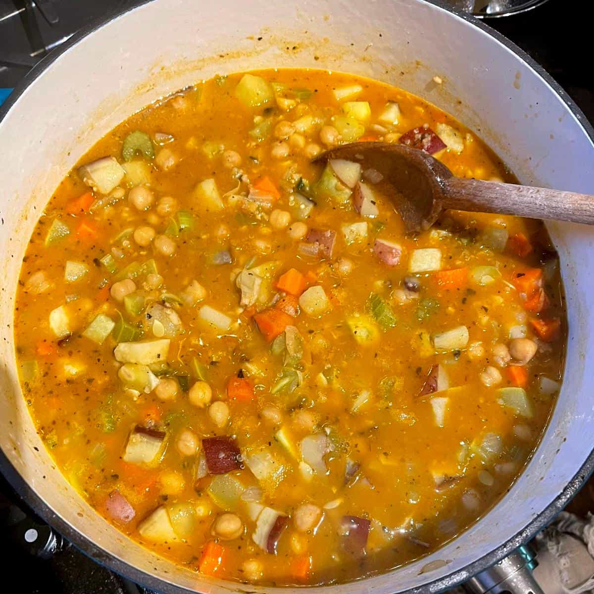 Calabrian chili paste and stock mixed into vegetable stew.