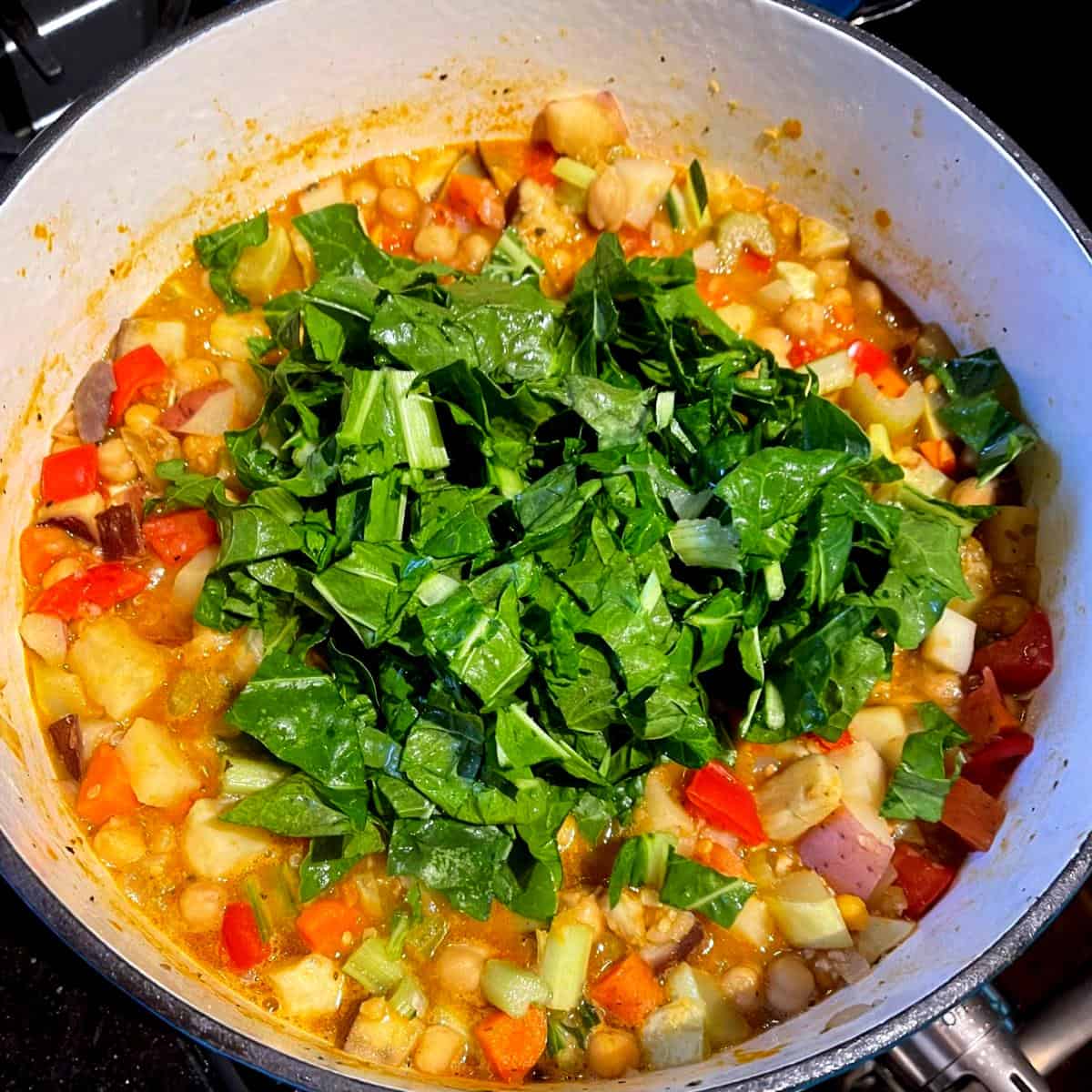 Swiss chard added to vegetable stew.