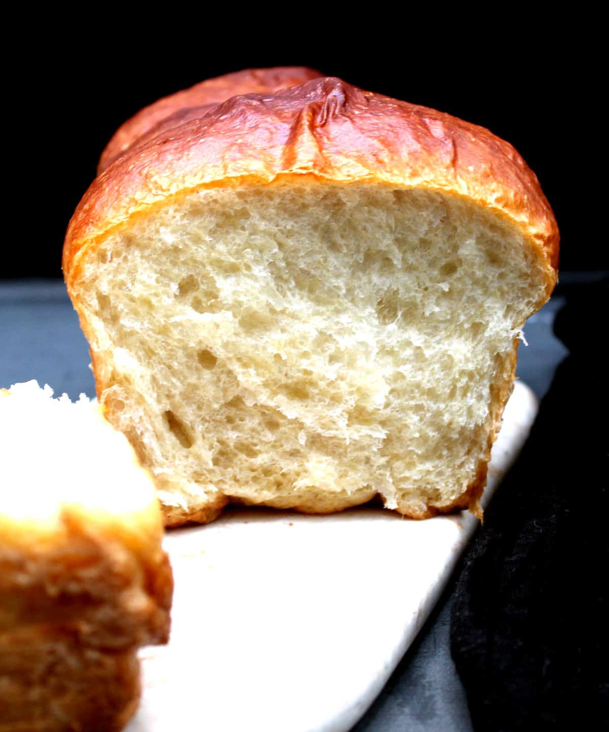 Vegan olive oil brioche with feathery, soft, light crumb.
