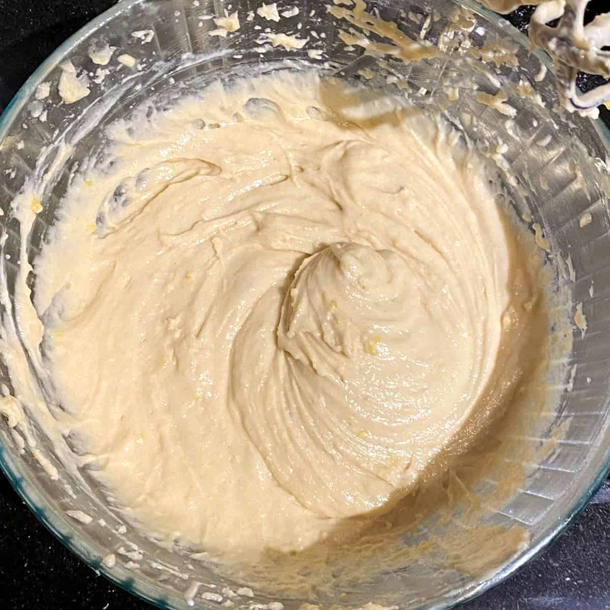 Batter for vegan pound cake with dry and wet ingredients mixed.